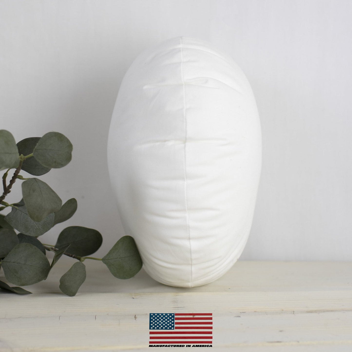 hypoallergenic round pillow.|